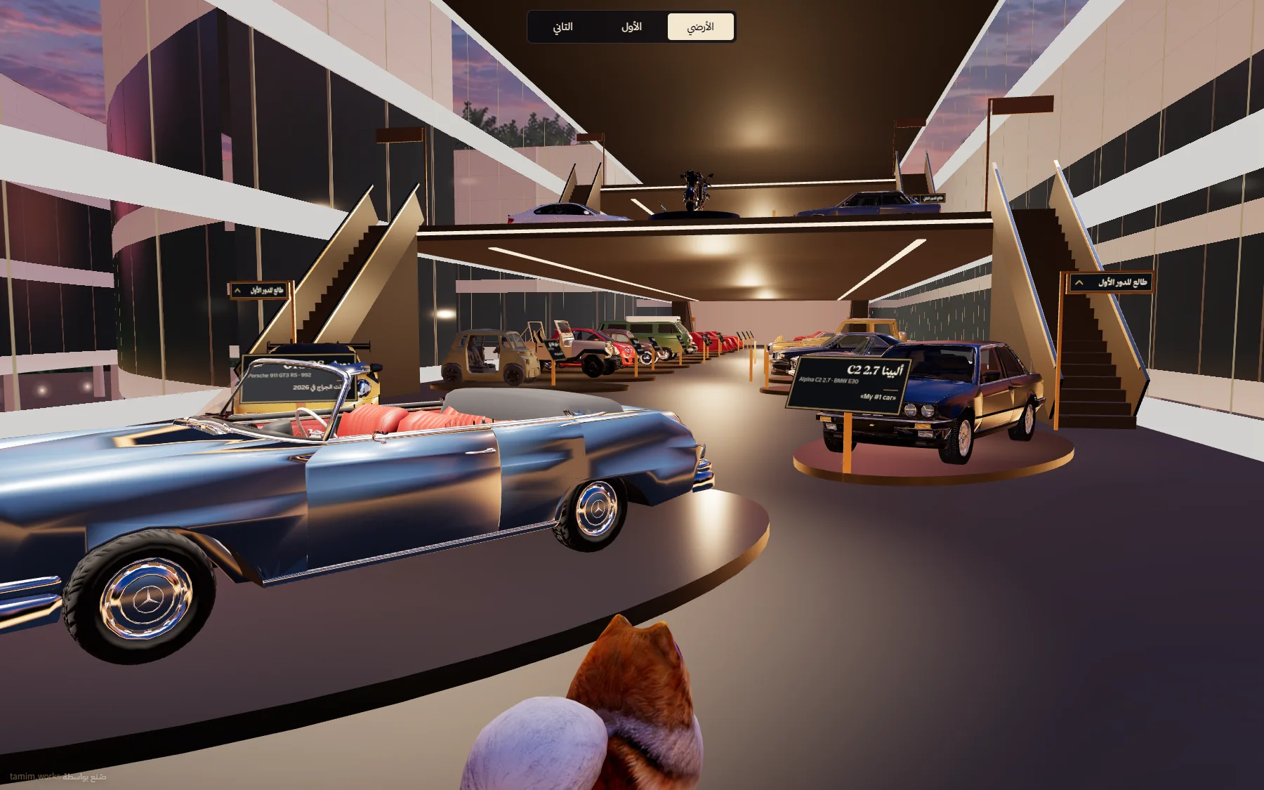 The lobby: a blue 1960s Mercedes 280SE Cabriolet with a red interior on a round plinth, floors and stairs above.